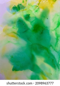 green yellow and blue alcohol ink watercolour background in bled green yellow gradient tones