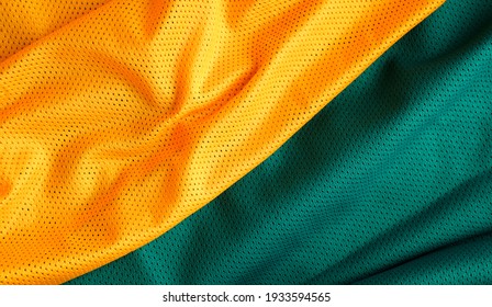 Green And Yellow Jersey Texture Background. Sport Clothing Fabric Texture Background