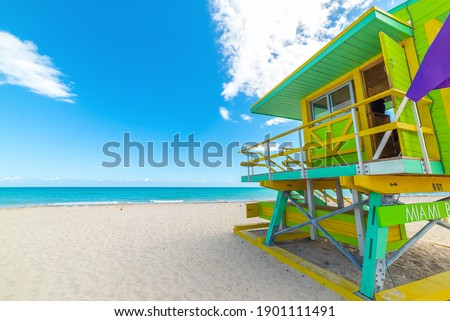 Green and yellow lifeguard tower in world famous South Beach in Miami Beach, USA