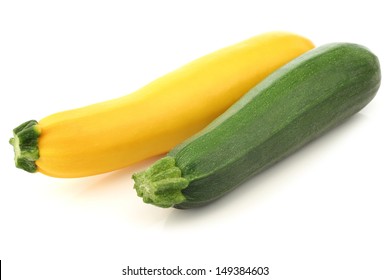 Green And Yellow Zucchini On A White Background