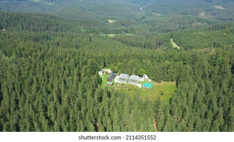 Greenhouse science station drone aerial open top chambers climate change research Bily Kriz, plant spruce Picea abies Norway European and mountain beech Fagus sylvatica common for scientific