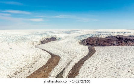 Greenlandic Melting Ice Sheet Glacier Aerial View From The Plane, Near Kangerlussuaq, Greenland