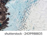 Greenlands Summer Melt Underway. Melt ponds on the surface of Greenlands ice sheet are an important indicator of the strength of the 2013. Elements of this image furnished by NASA.