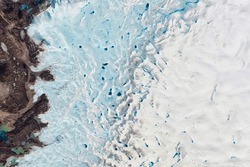 Greenlands Summer Melt Underway. Melt Ponds On The Surface Of Greenlands Ice Sheet Are An Important Indicator Of The Strength Of The 2013. Elements Of This Image Furnished By NASA.