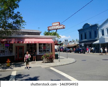 Greenport, NY - July 14 2019: Exterior of Crazy Beans restaurant on Front Street with vintage sign
