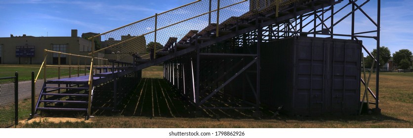 Greenport, NY / USA - 8/10/20:  Panoramic View Of The Empty Bleachers At A High School Football Field                               