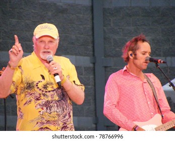 GREENSBORO, NC - JUNE 5: Mike Love And Christian Love Of The Beach Boys Perform Onstage At White Oak Amphitheater At The Greensboro Coliseum In Greensboro, NC On June 5, 2011.