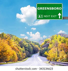 GREENSBORO road sign against clear blue sky