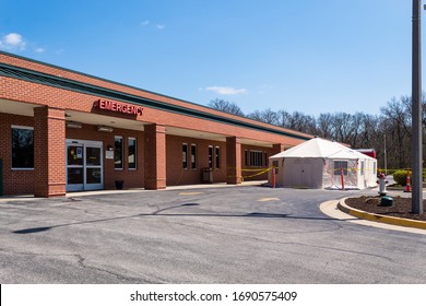 GREENVILLE, ILLINOIS/USA - APRIL 01, 2020: COVID-19 Triage Tent Set Up Outside ER Of Small Rural Hospital.Small Rural Hospitals Like This One Will Be Hard Pressed To Handle A Large Influx Of Infected.