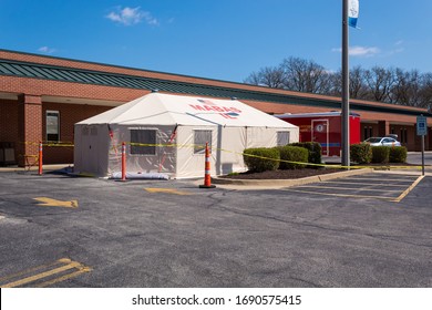 GREENVILLE, ILLINOIS/USA - APRIL 01, 2020: COVID-19 Triage Tent Set Up Outside ER Of Small Rural Hospital.Small Rural Hospitals Like This One Will Be Hard Pressed To Handle A Large Influx Of Infected.