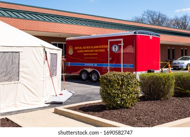 GREENVILLE, ILLINOIS/USA - APRIL 01, 2020: COVID-19 Triage Tent Set Up In Parking Lot Of Small Rural Hospital. Rural Hospitals Like This One Will Be Hard Pressed To Handle A Large Influx Of Cases