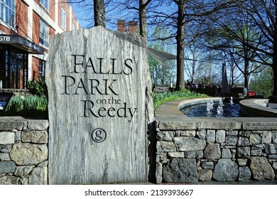 Greenville, SC - USA - 03-21-2022: Falls Park on the Reedy sign at the entrance of downtown Greenville's popular public park along the Reedy River   