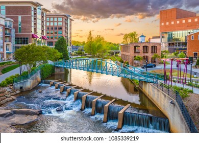 Greenville, South Carolina, USA downtown cityscape on the Reedy River at dusk. - Shutterstock ID 1085339219