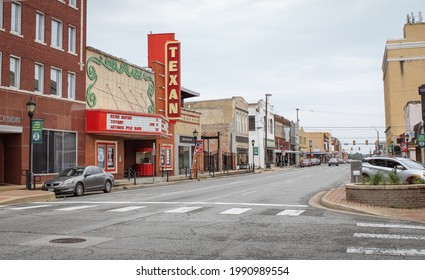 Greenville, Texas United States - June 1 2021: the main street with a theater