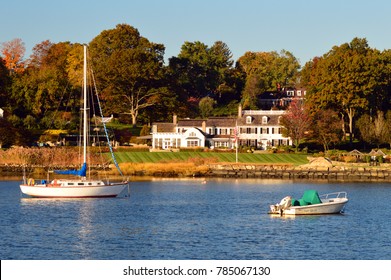 Greenwich, CT, USA October 27,  A sailboat is moored in front of a luxury waterfront estate in Greenwich, Connecticut.  The town is one of the wealthiest in the United States 