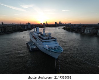 Greenwich, London, UK 24th April 2022 Drone Shot Of MS Deutschland Moored On The River Thames At Sunset.