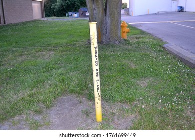 Greenwood, Indiana / United States - June 22 2020: Warning Gas Pipeline Closeup View