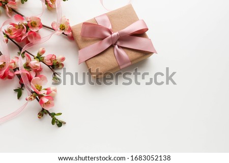 greeting card design. gift concept. gift box, flowers and an envelope on a white background. invitation. congratulation