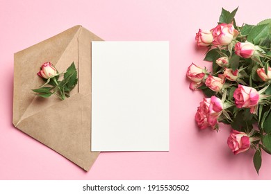 Greeting Card Mockup With Envelope And Fresh Roses On Pink Background