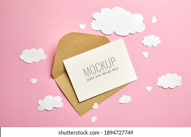 Greeting Card Mockup With Paper Decorations On Pink Background