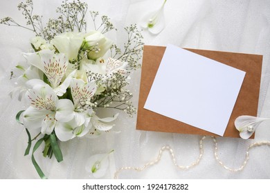  Greeting Card Mockup. Small Bouquet Of White Flowers And Space For Text 
