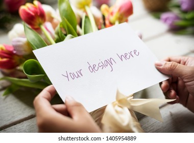 Greeting card mockup with a tulip bouquet