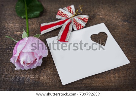 Greeting card with pink rose and fill or empty copy space