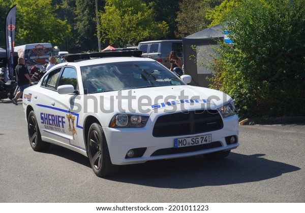 Grefrath,Germany-August 28,2022: 2011-2014 Dodge\
Charger LX as Sheriff Police Car at Grefrath US Cars show 2022,is\
second generation  of a full-size sedan by the US manufacturer\
Dodge since\
2010