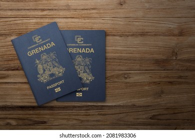 Grenada Passport On Wooden Background Citizenship By Investment