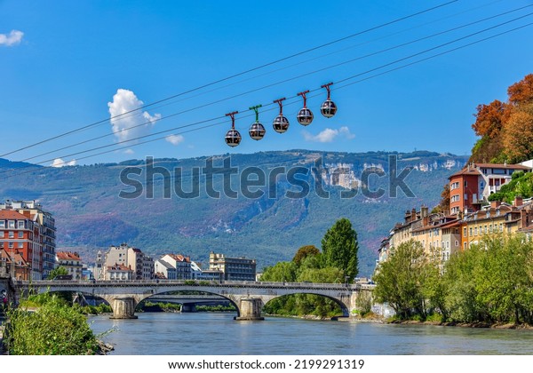 Grenoble-Bastille cable car, five bubbles on\
sling, transport to hill and fortress of Bastille cross Isere river\
in Grenoble,\
France.