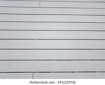 Grey Artificial Or Composite Wood Boards On Deck With Lines