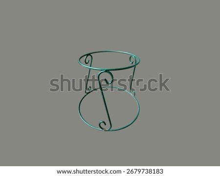 The grey background image is a green patterned steel frame base used to place potted plants, potted flowers, strong, placed on the table or placed as a decoration in the home or garden, easy.