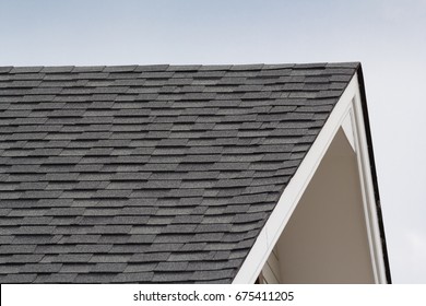 Grey And Black Roof Shingles Of House