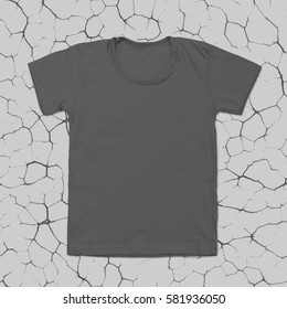 Grey blank t-shirt on dark cracked background