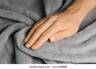 Grey Blanket Texture. Wave Material Pattern. Gentle And Fluffy Blanket. Woman Touching Grey Blanket