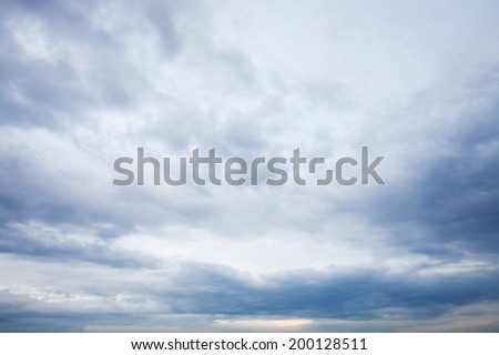 grey blue clouds in evening sky in summer