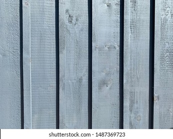 Grey Board And Batten Wall With Vertical Stripes