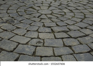 Grey Brick Stone Street Road. Light Sidewalk