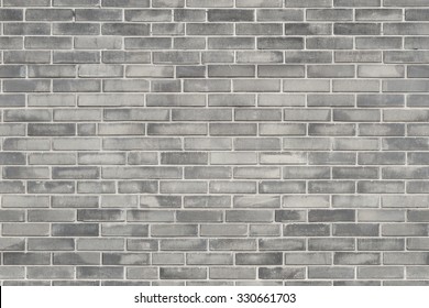 Grey Brick Wall Texture Background. Tiled.