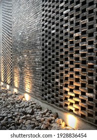 Grey Bricks Sort For Wall Design And Decoration With Up Lighting For Landscape And Hardscape Design And Idea.