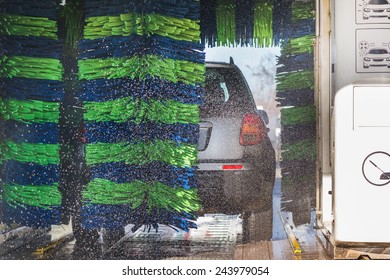 Grey car during washing process