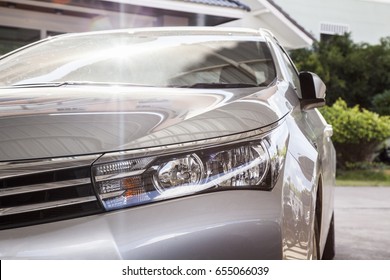 Grey Car Front View In The Parking