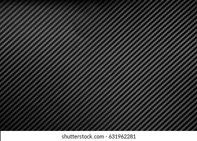 grey carbon fiber composite raw material background - Shutterstock ID 631962281