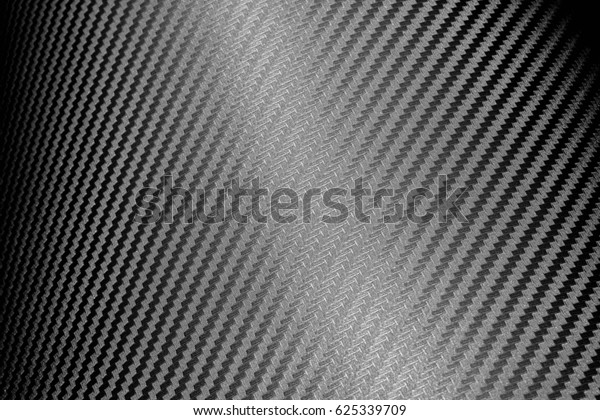 grey\
carbon fiber composite raw material\
background