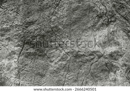 Grey cave wall surface with scratch for abstract background and texture. Template for design, natural patterns, space for work, banner,seamless wallpaper, close up.