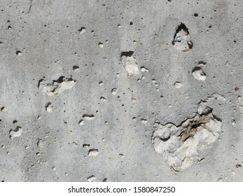 Grey Cement surface with some holes 