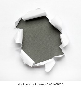 Grey circle shape breakthrough paper hole with white background