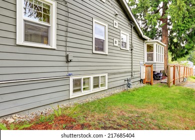 Grey Clapboard Siding House Wall With Windows