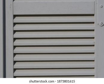 A Grey Closed Shutter At Pesmes.