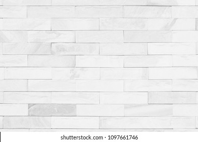 grey colors and white brick wall art concrete stone texture background in wallpaper limestone abstract paint to flooring and homework/Brickwork or stonework clean grid uneven interior rock old.